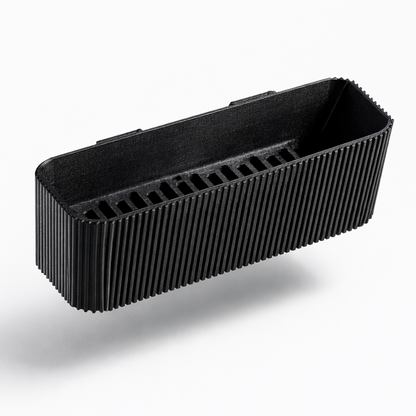 Black rectangular plastic tray for cat toilet scoop holder, on a white background